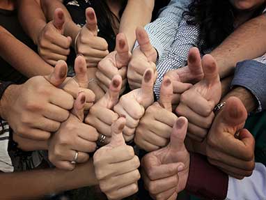 Group of thumbs up with ink